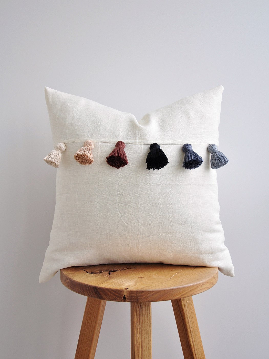 Pillow with tassels