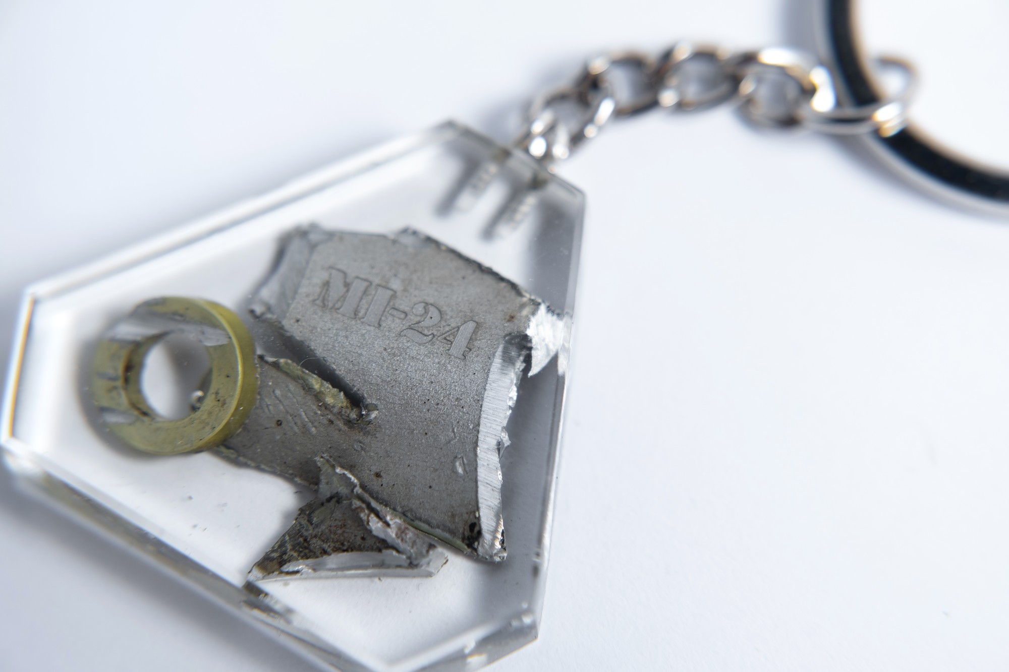 A keyring with the piece of a downed Russian Mi-24 helicopter