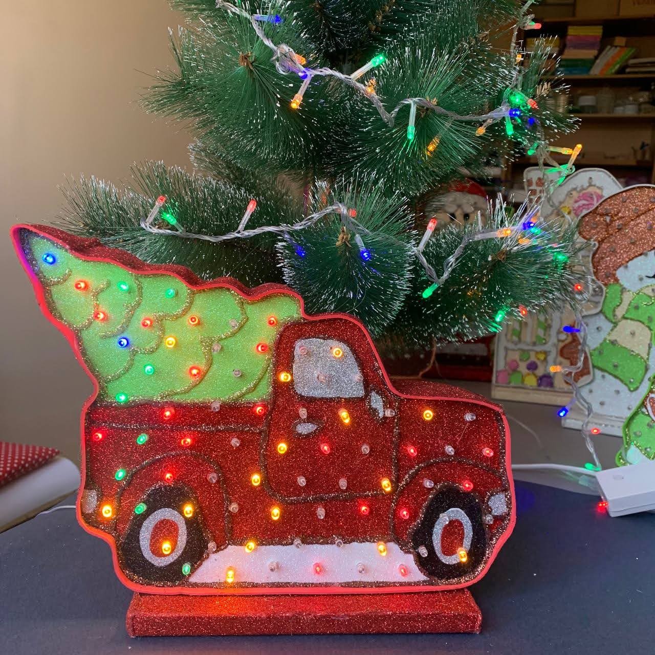 New year's car installation under the christmas tree christmas