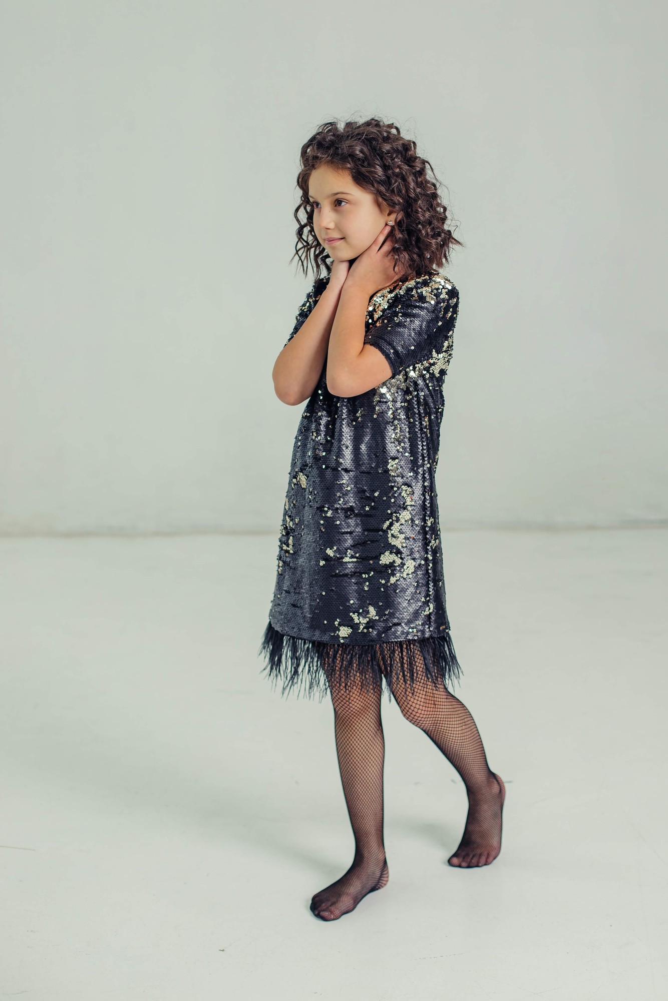 The perfect black dress with feathers  Renard