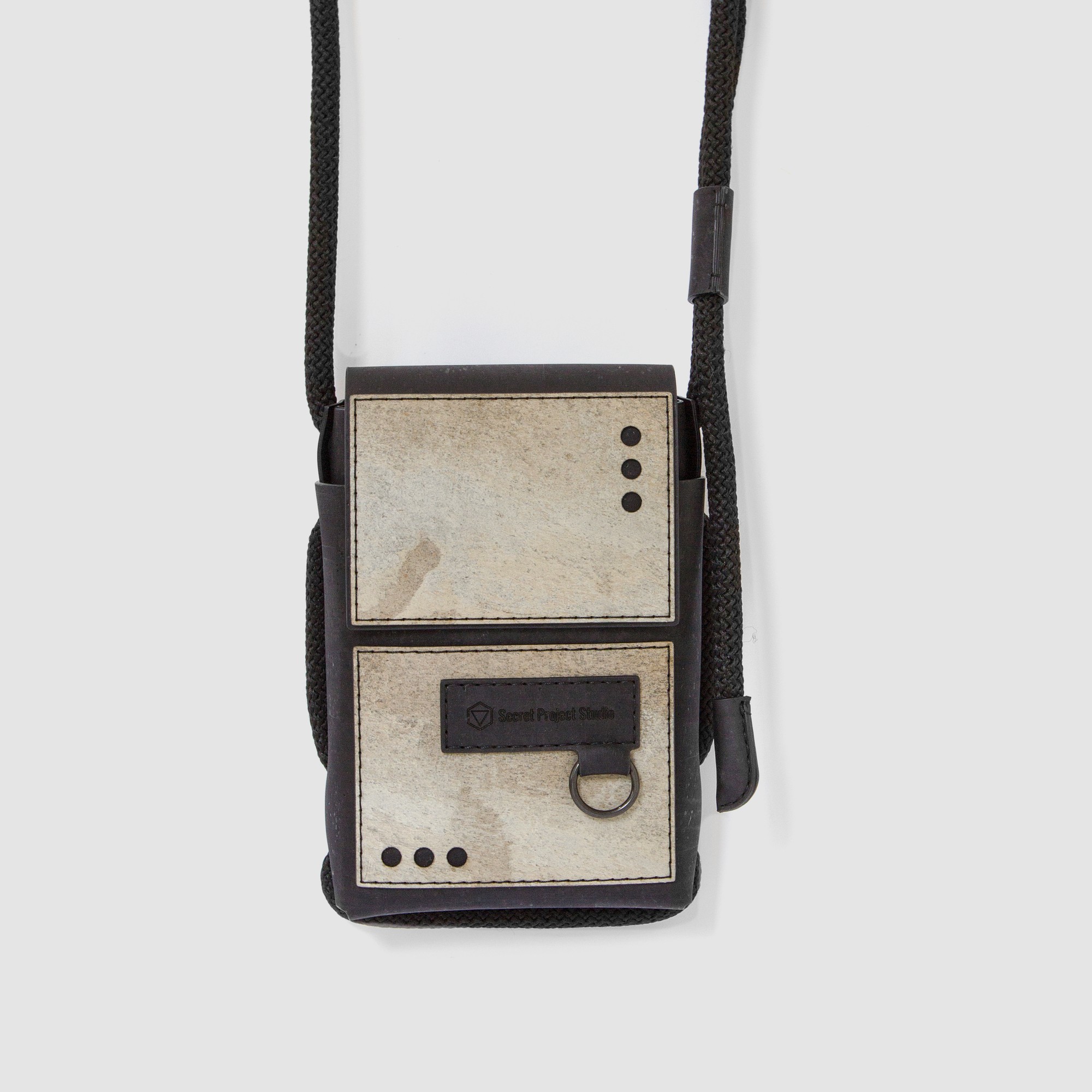 Protego S ME - small vegan crossbody bag made from black cork and taupe stone
