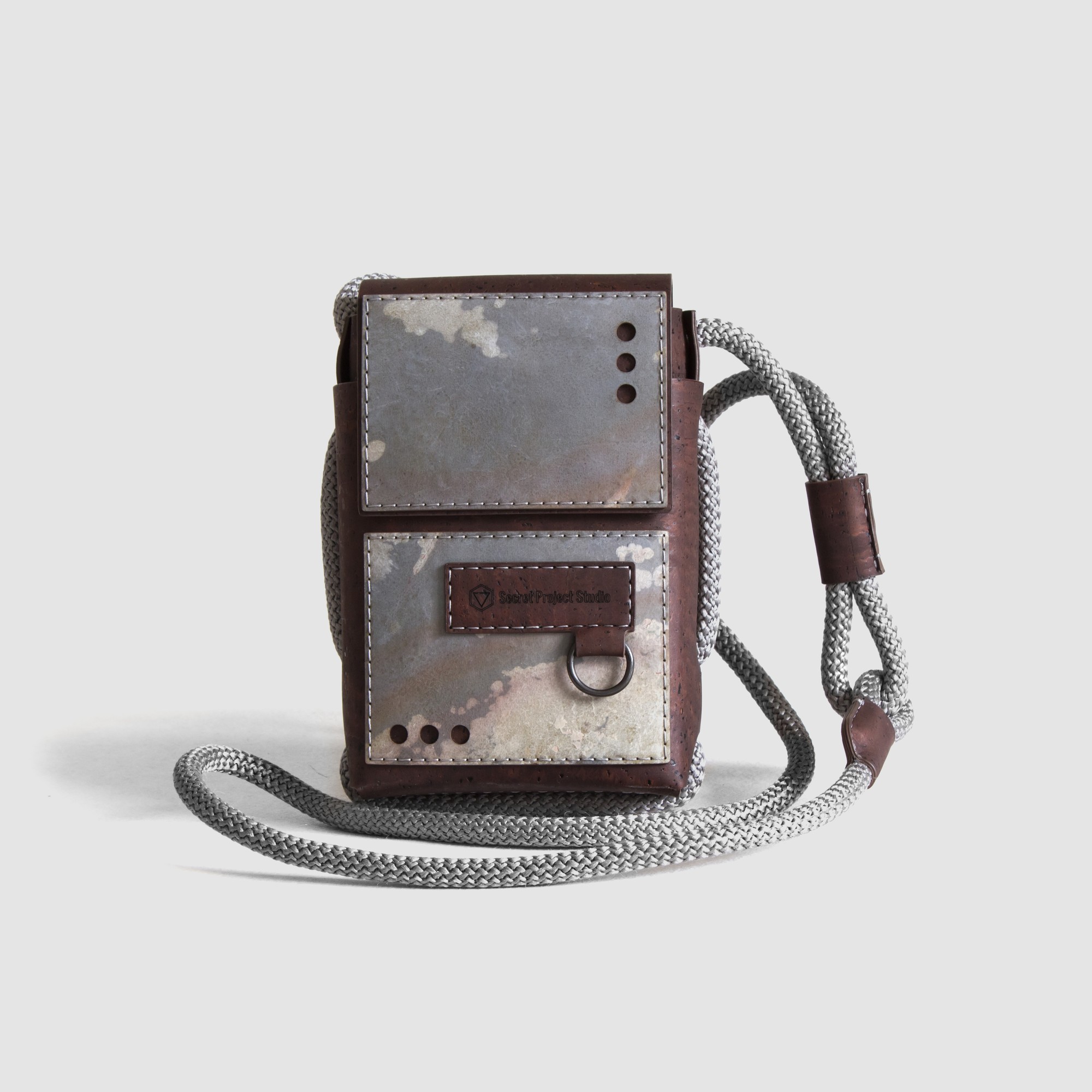 Protego S ME - small vegan crossbody bag made from brown cork and fallen leaves stone