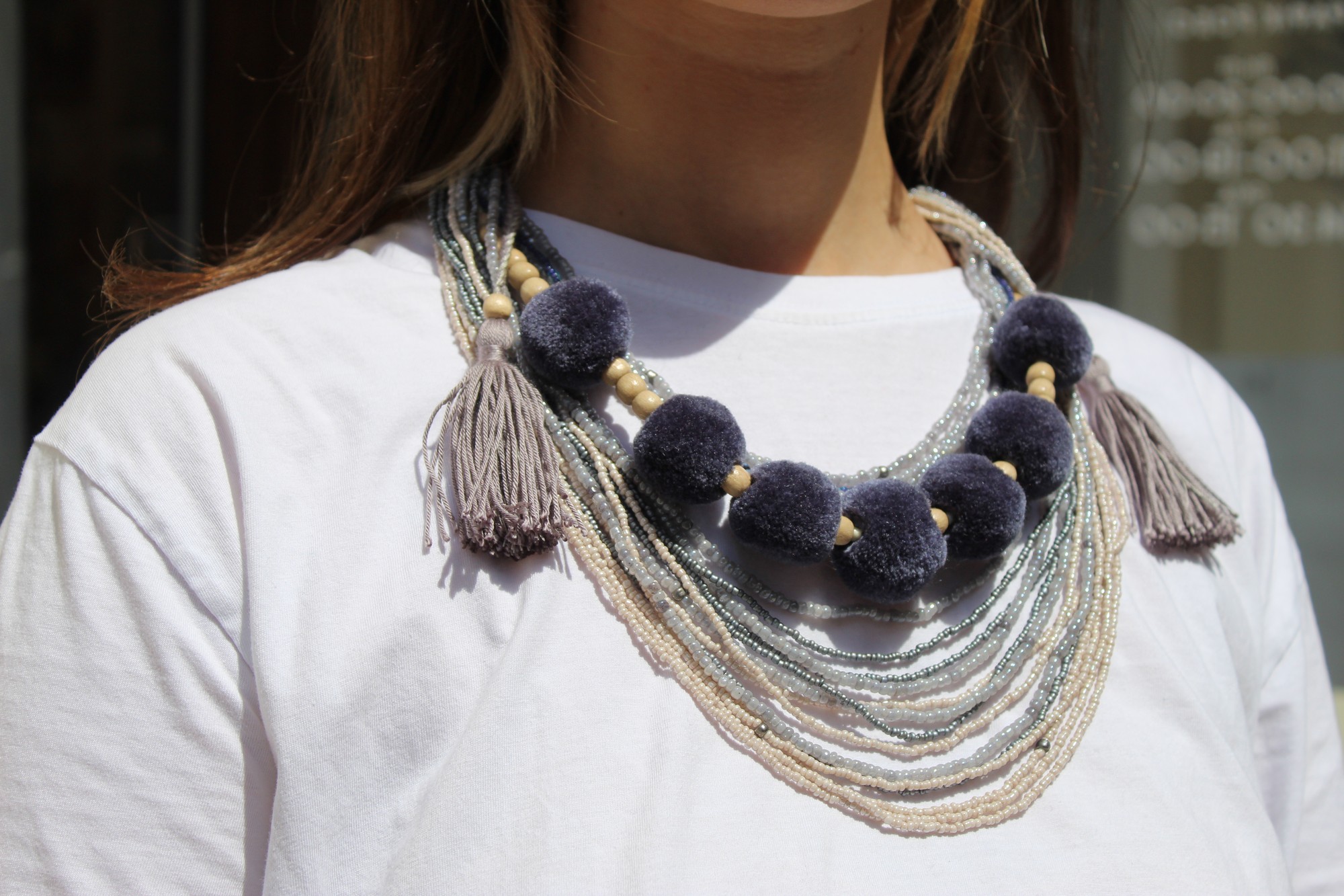 Gray beaded necklace with tassels