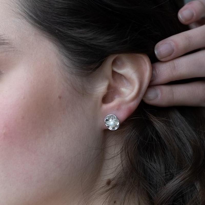 Pearl on a leaf earrings