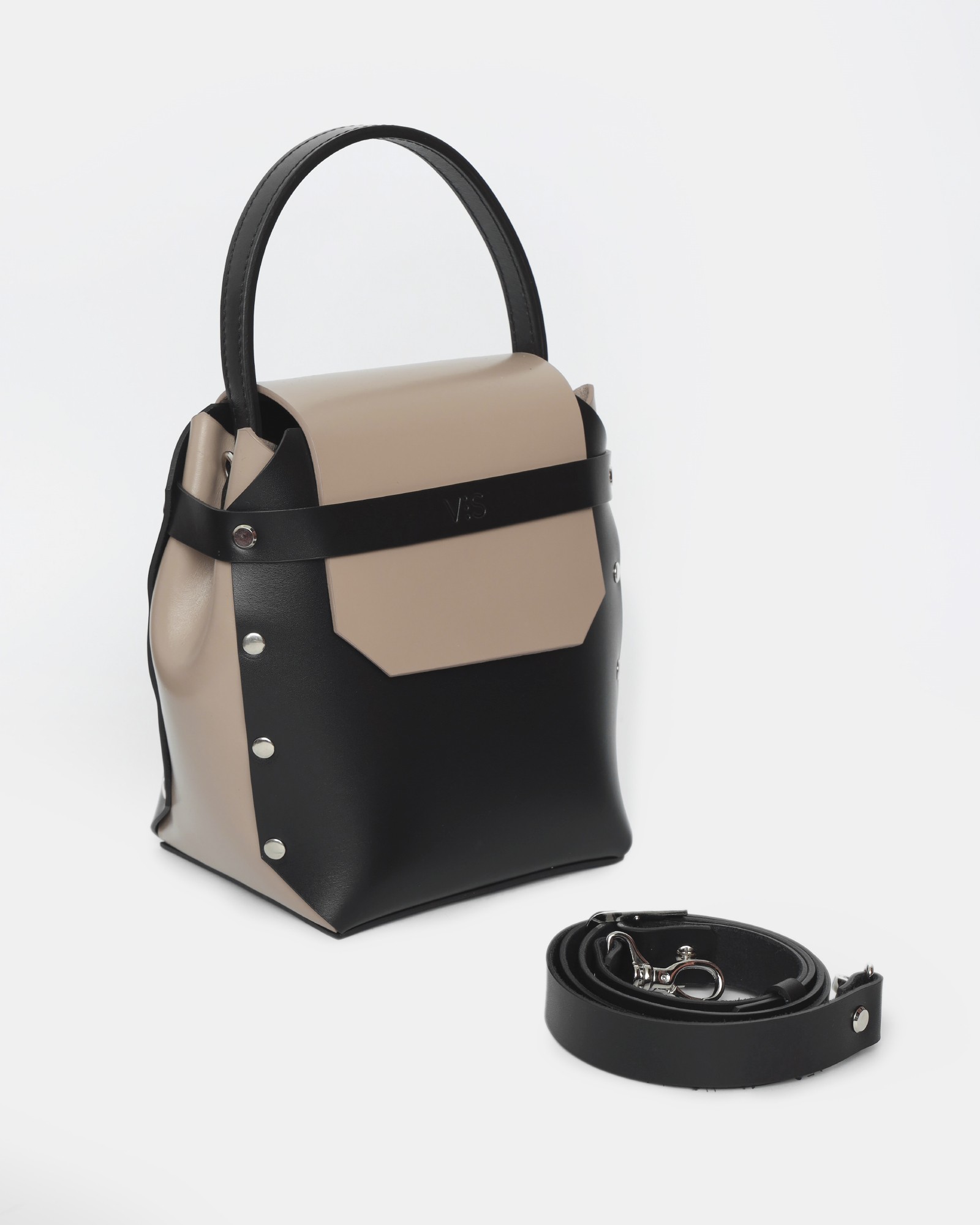 Adhara Leather Bag in black and beige color