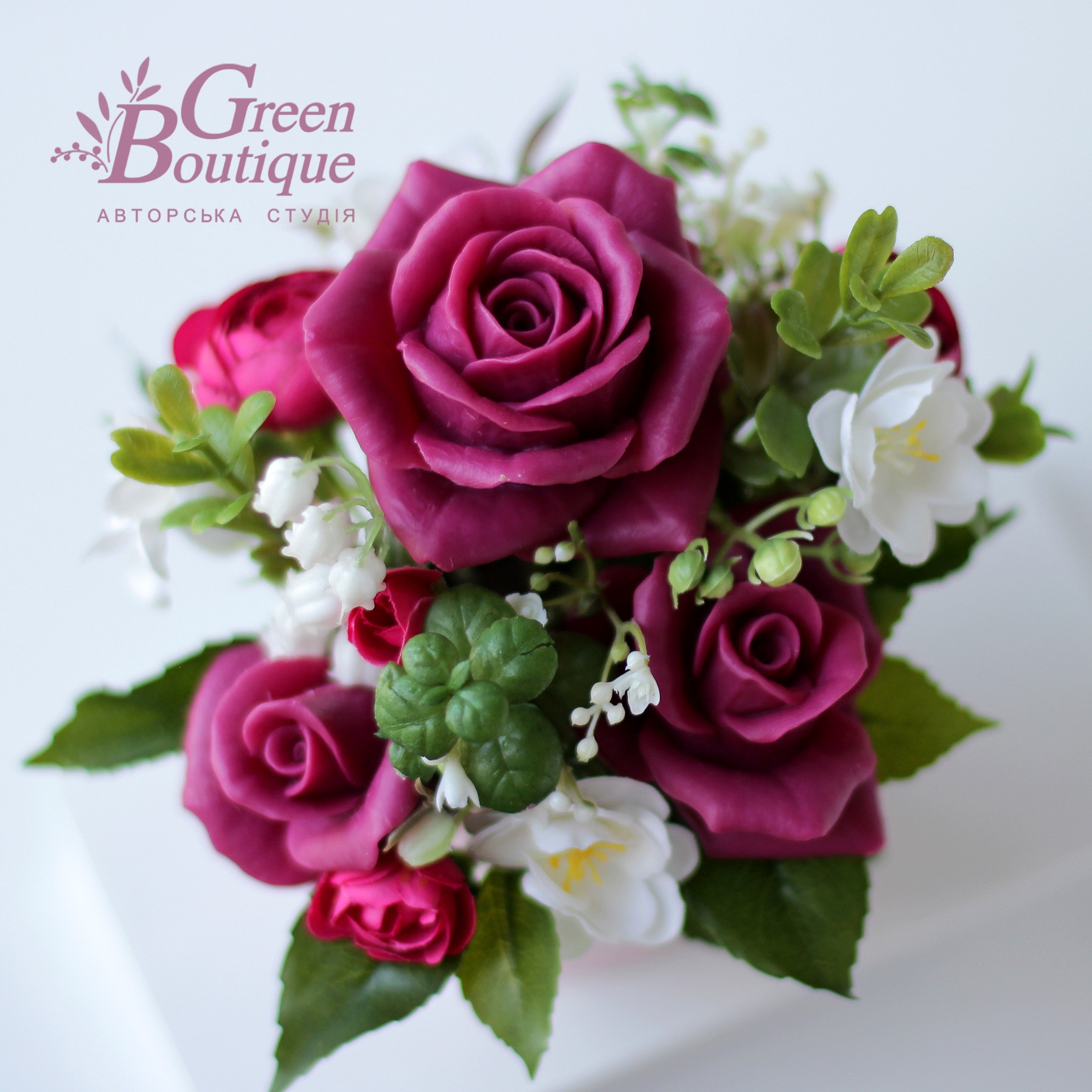 Interior bouquet of soap, cherry roses with lilies of the valley and cherry blossoms