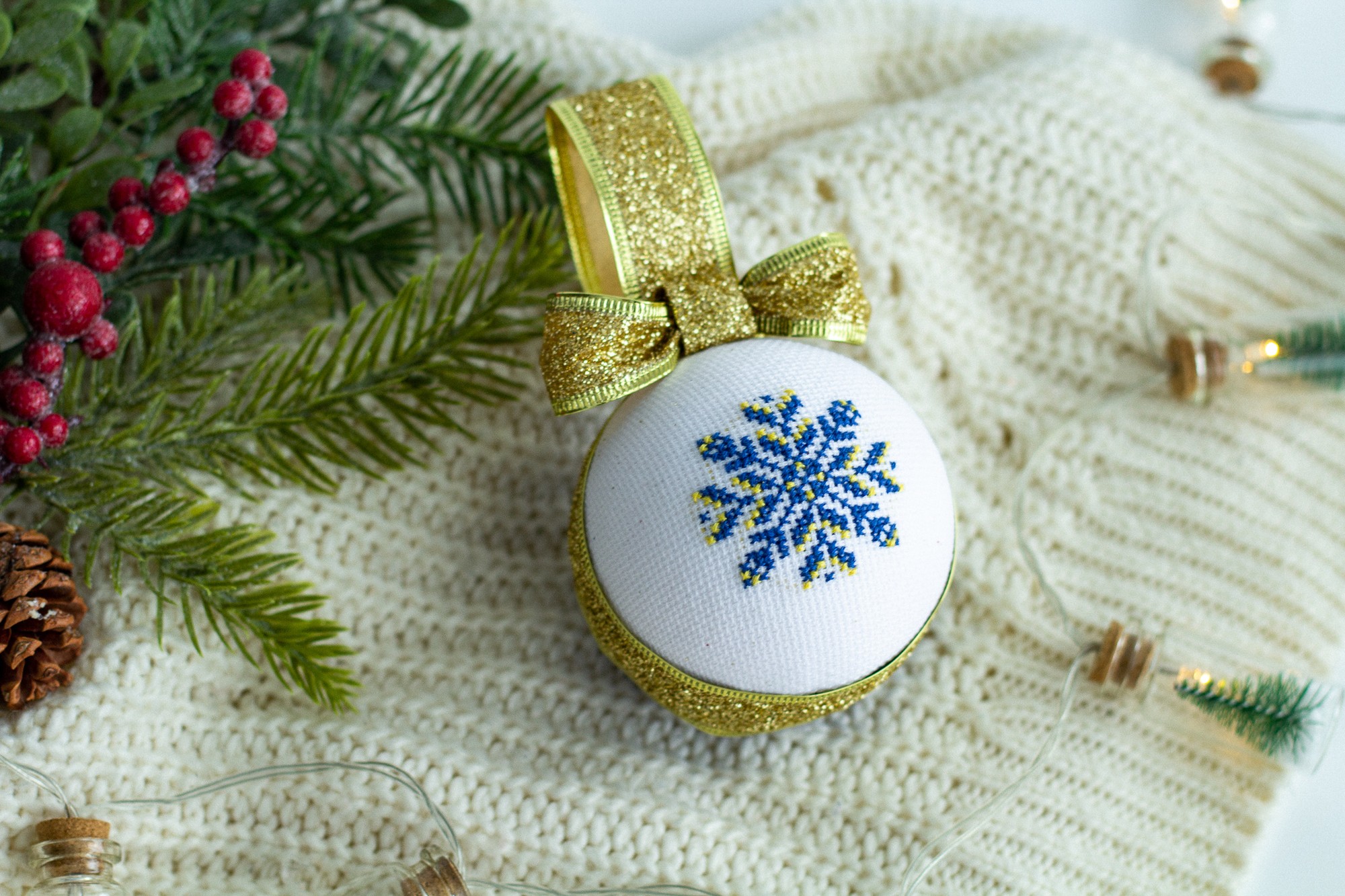 Christmas ball with ukrainian ornament in blue-yellow color ...