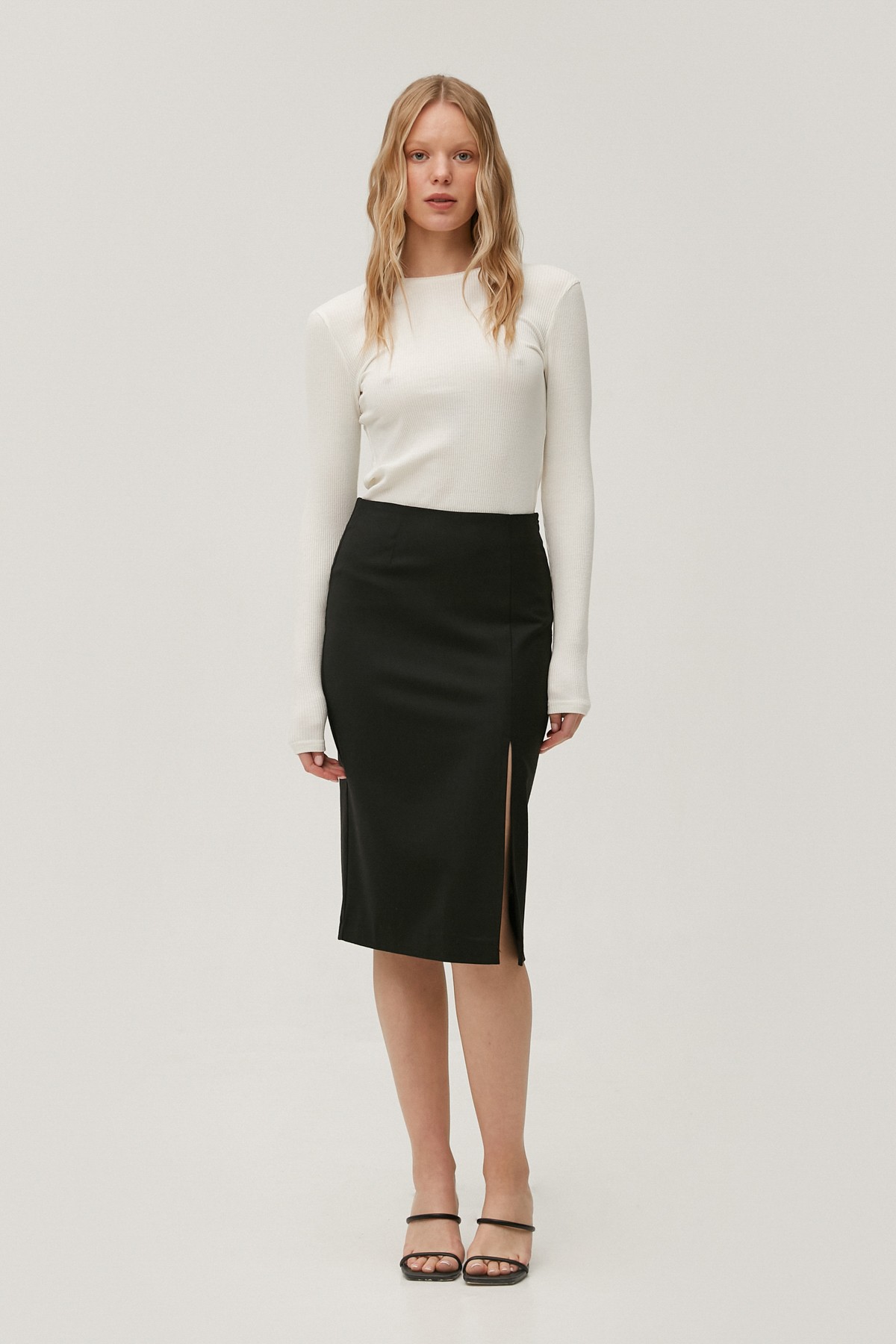 Black midi skirt made of suiting fabric with wool