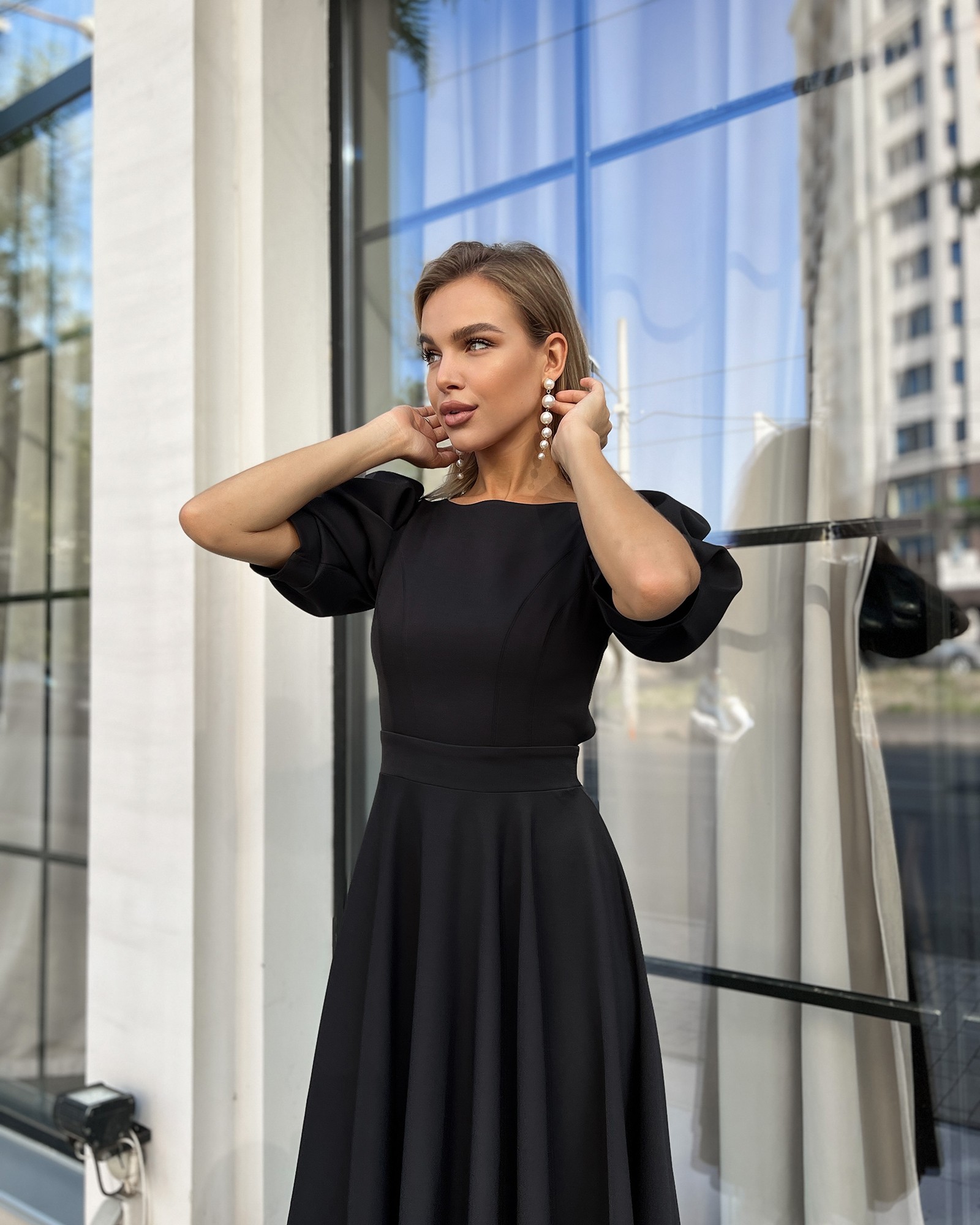Black cocktail dress by Tanita-Romario