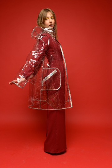 Transparent raincoat with silver edging, vinyl waterproof women's jacket