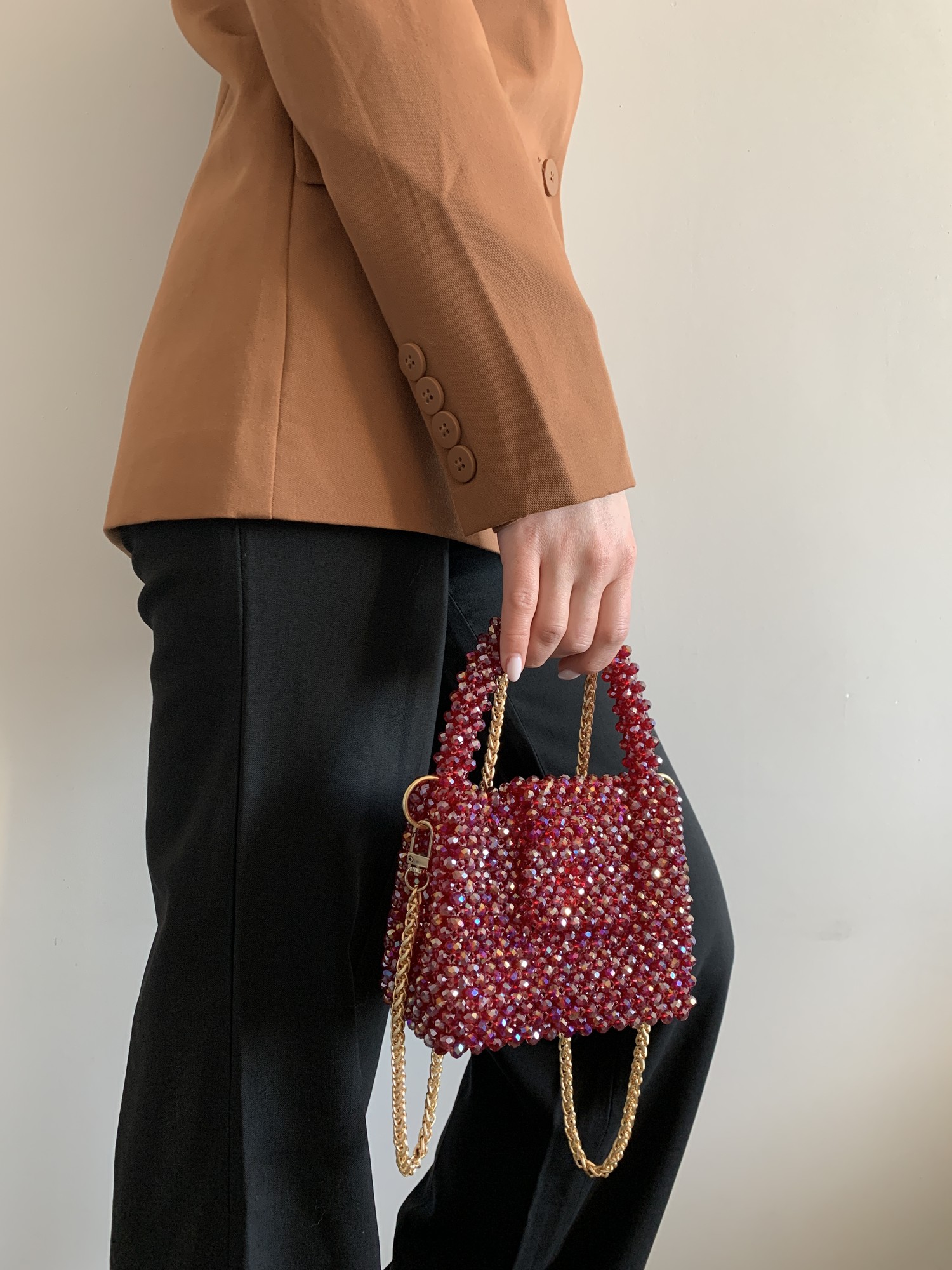 Bag made of bright burgundy beads