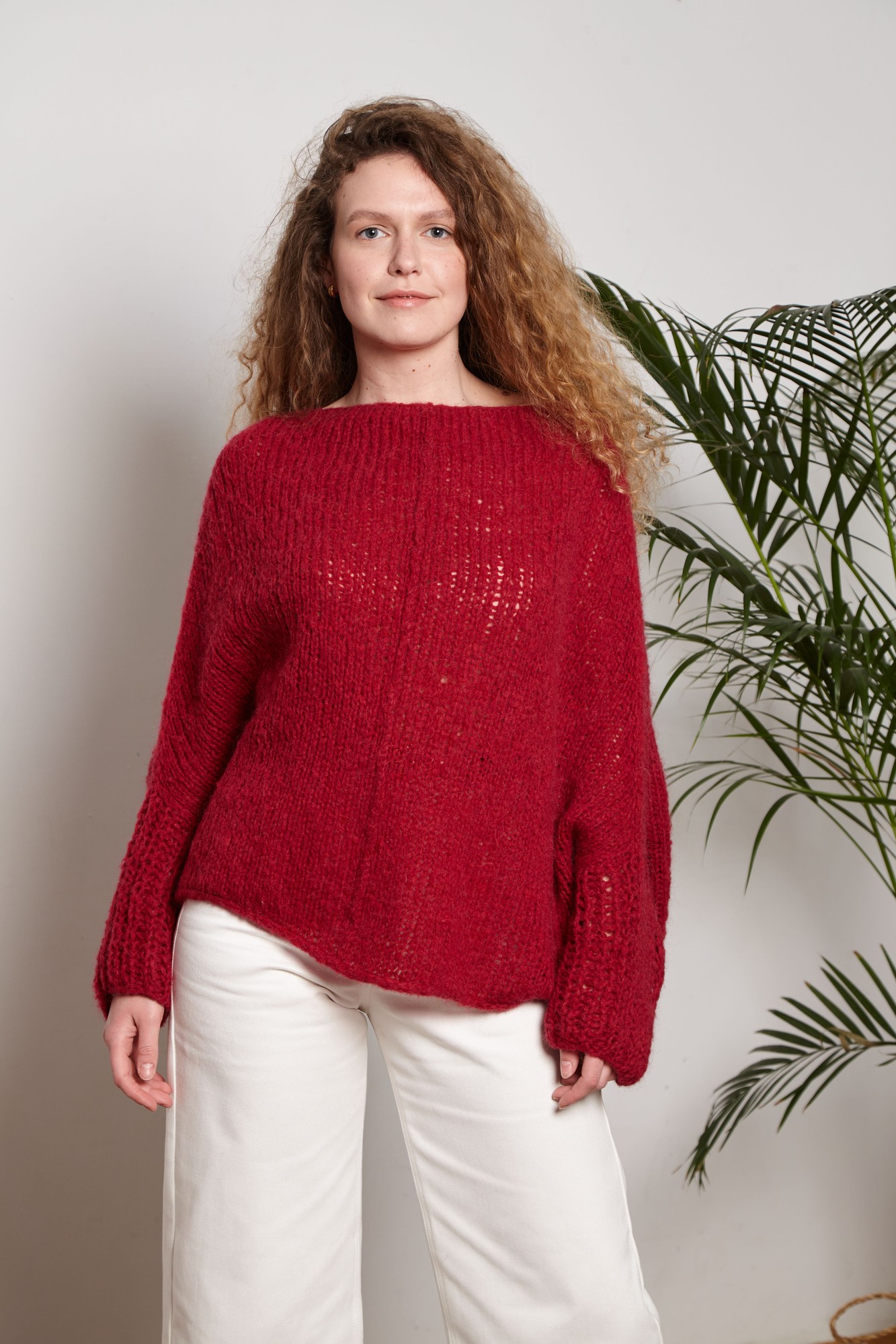 Red hand-knitted sweater