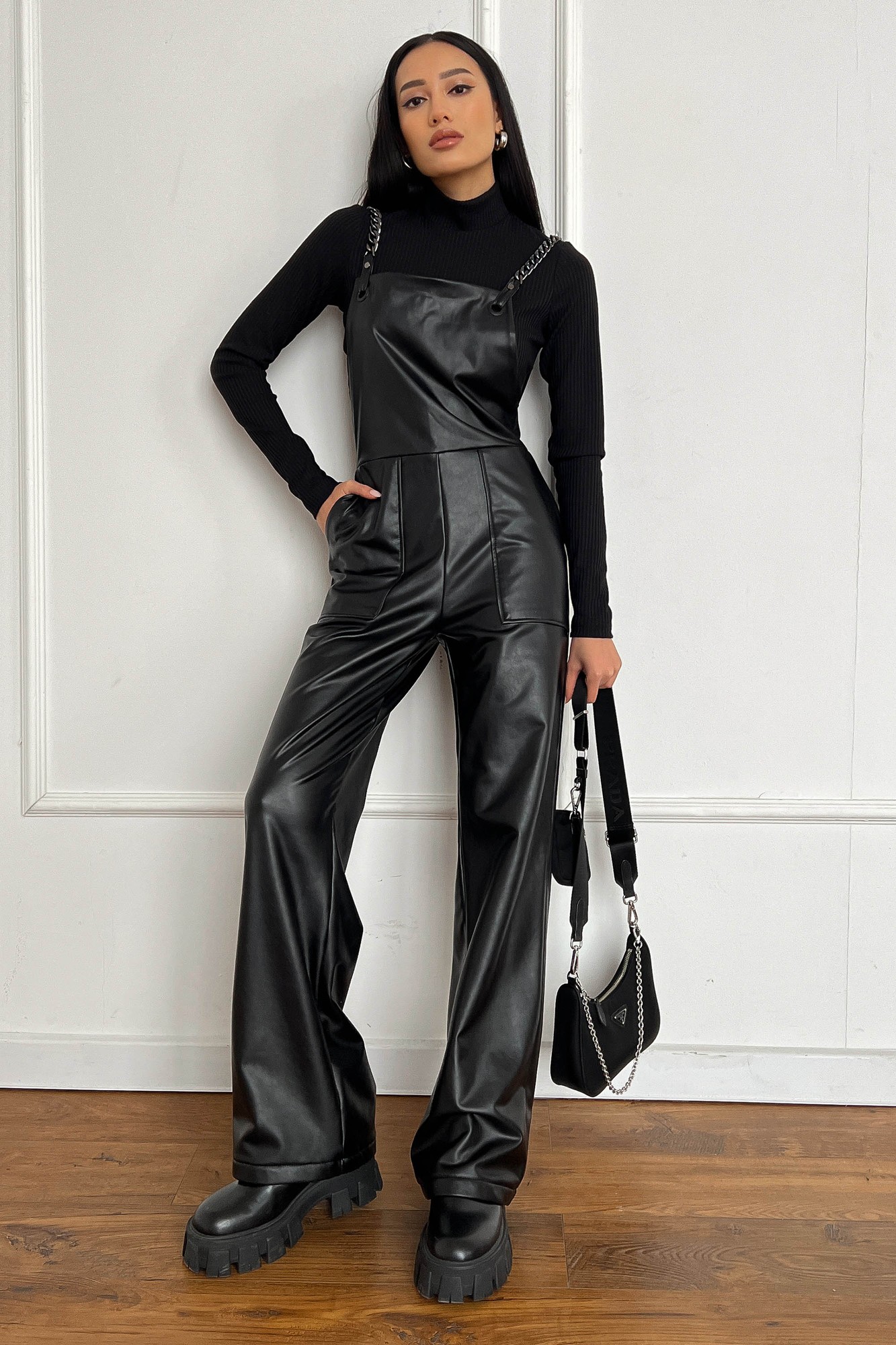 Elegant women's overalls made of artificial leather