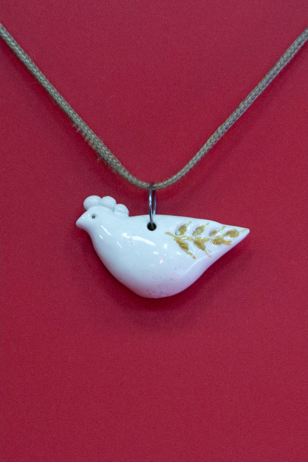 White ceramic pendant Bird with ear of wheat