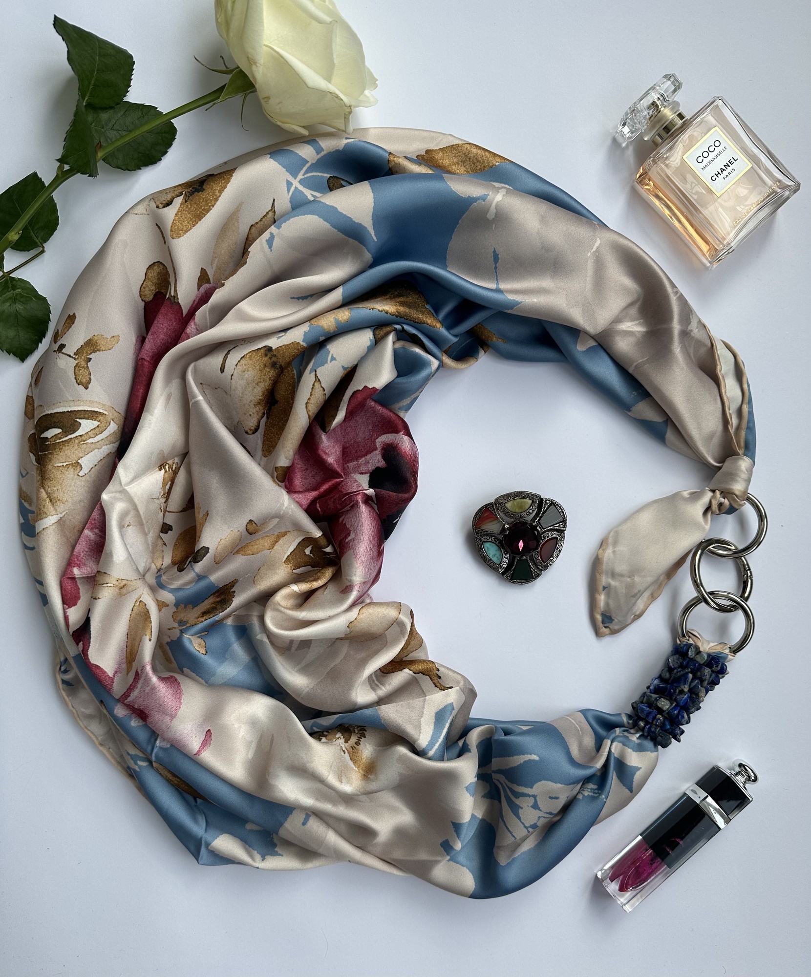 Scarf "Blue sakura in the morning garden”” from the brand MyScarf. Decorated with natural turquoise