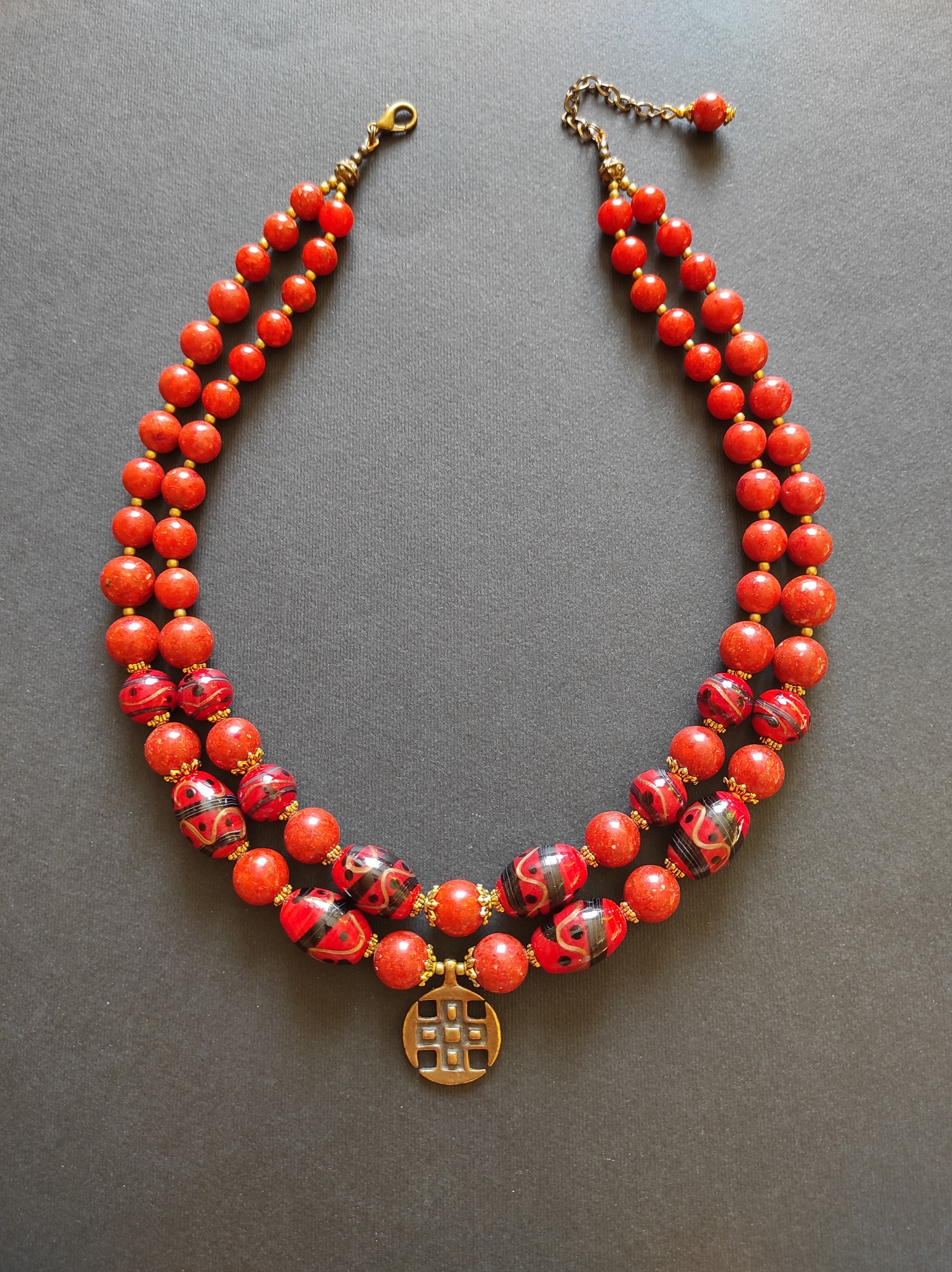 Necklace "Red pysanky" from glass and sponge coral
