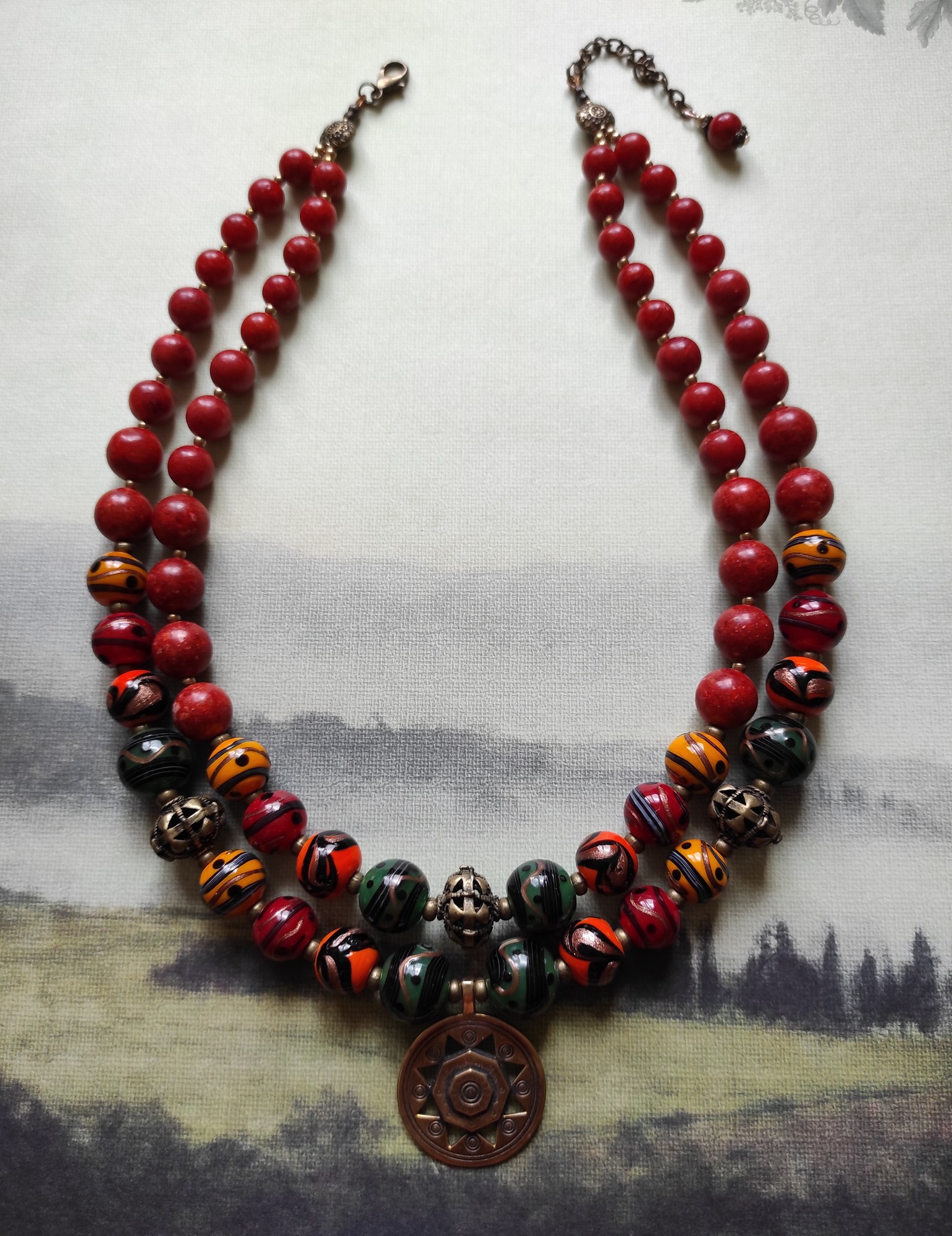 Necklace "Pysanky from Kosmach" from glass and sponge coral
