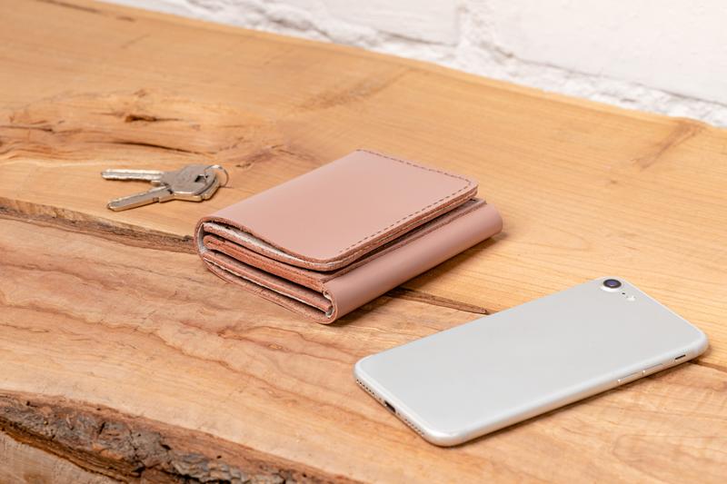 Coin button smooth leather wallet with zipped pocket