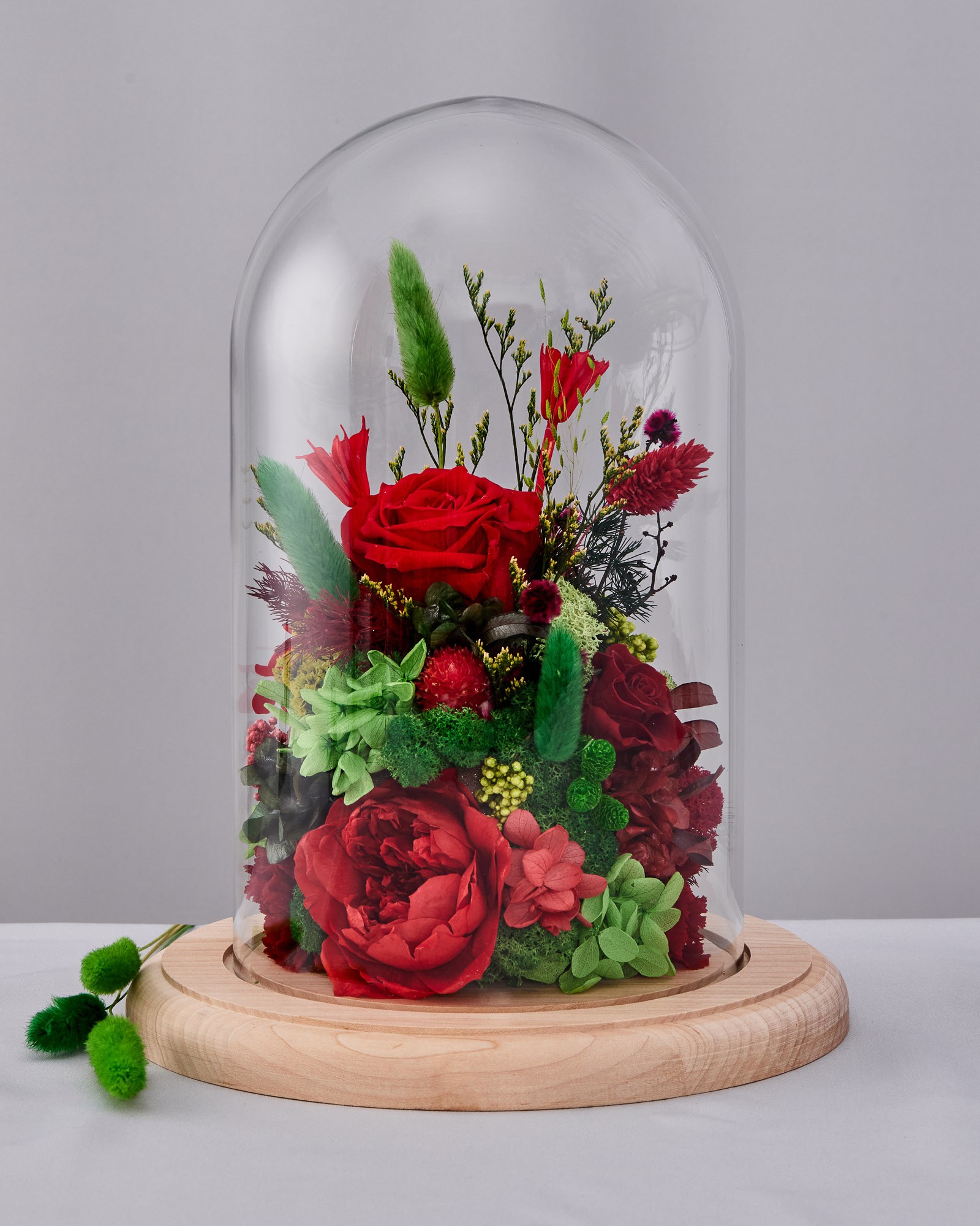 Flowers in glass dome "At the peak of feelings"