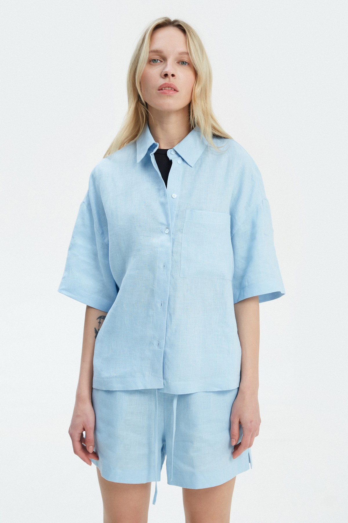 Blue linen shirt with elbow length sleeves