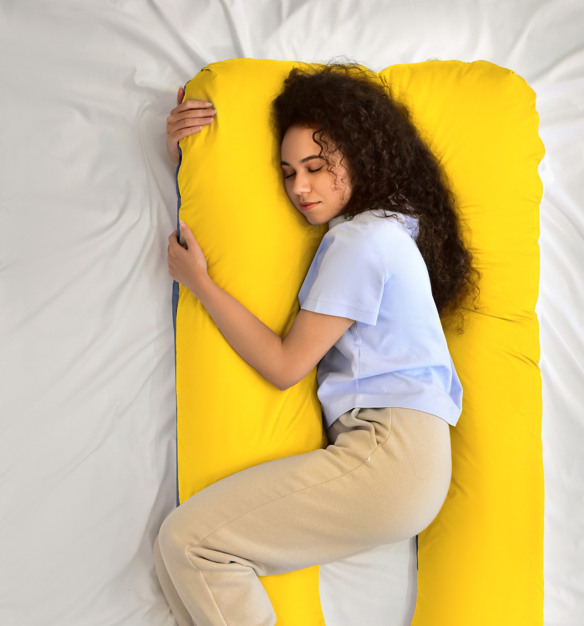 Ushaped sleeping pillow comfort, support, and rest in every position