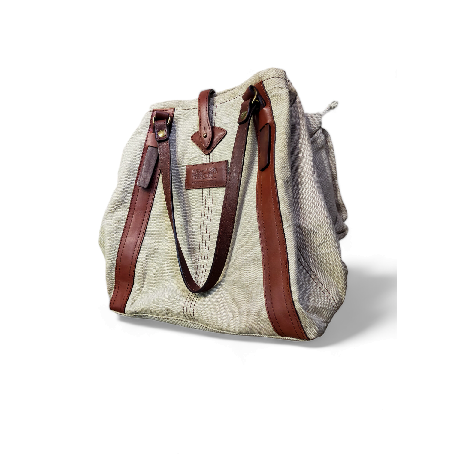 Canvas bag with natural leather parts