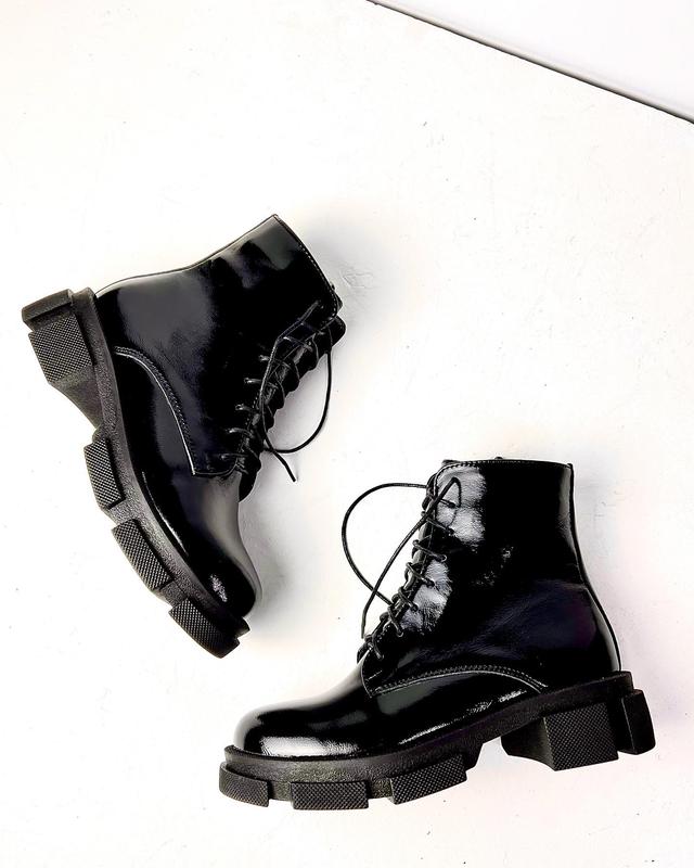 Black boots in patent leather