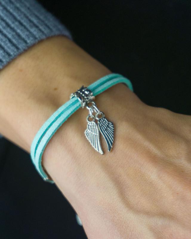 Suede bracelet - amulet with pendant "wings"