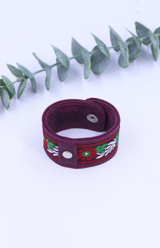 Handcrafted purple leather bracelet with fabric insert on metallic button
