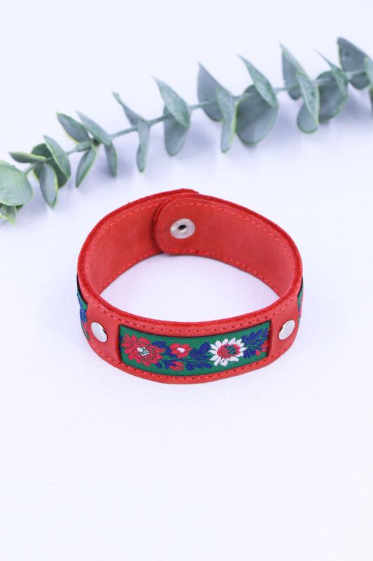 Red leather cuff bracelet with fabric insert on metallic button