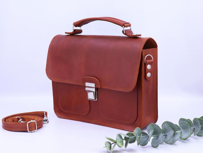 Women's leather briefcase bag with top handle and shoulder strap