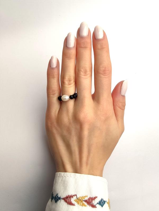 Black ring with a Pearl