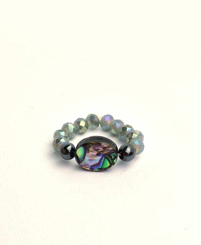 Green ring with treated glass and natural mother-of-pearl