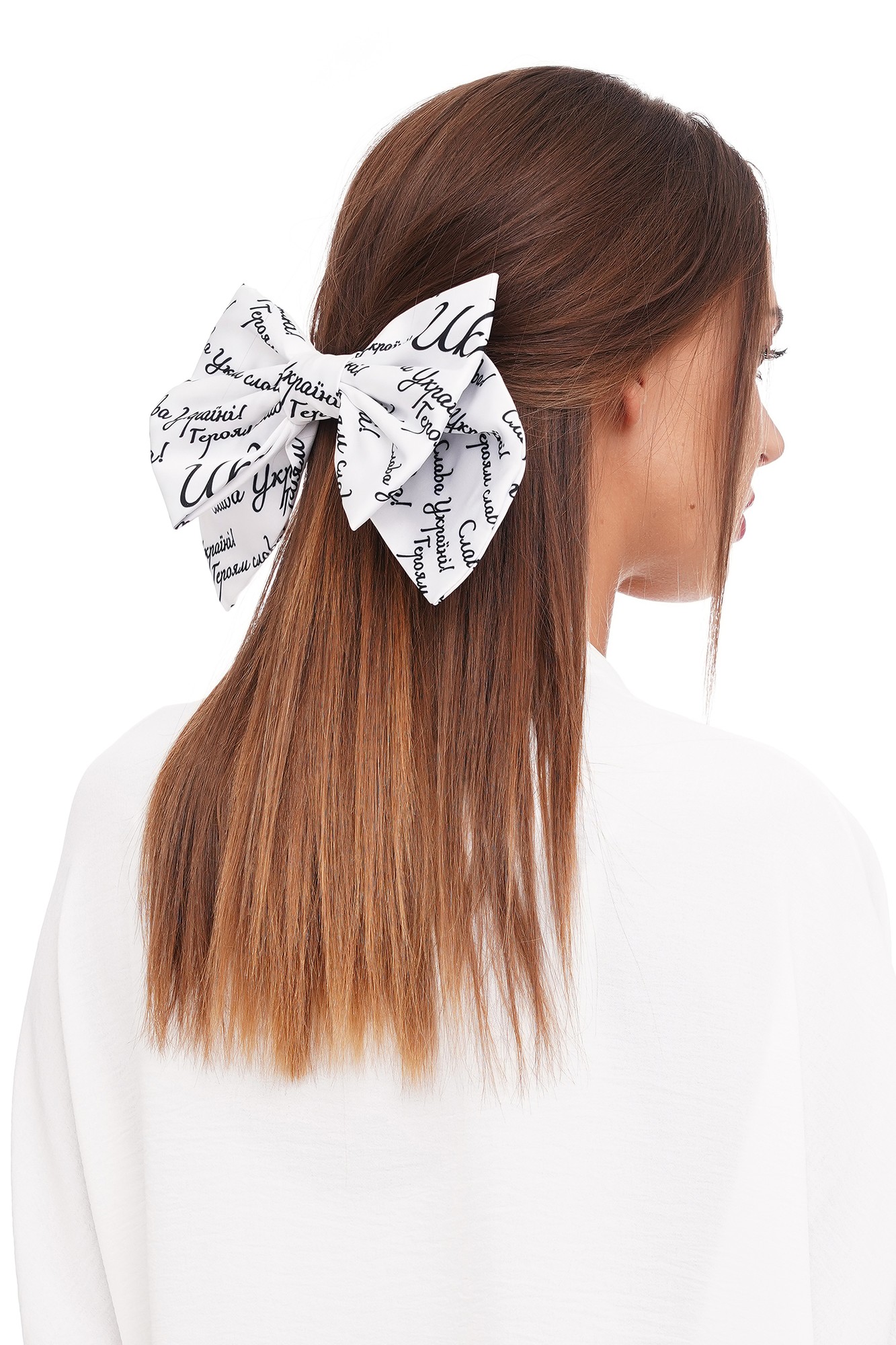 White bow with black letters. Collection "With Ukraine in the heart"