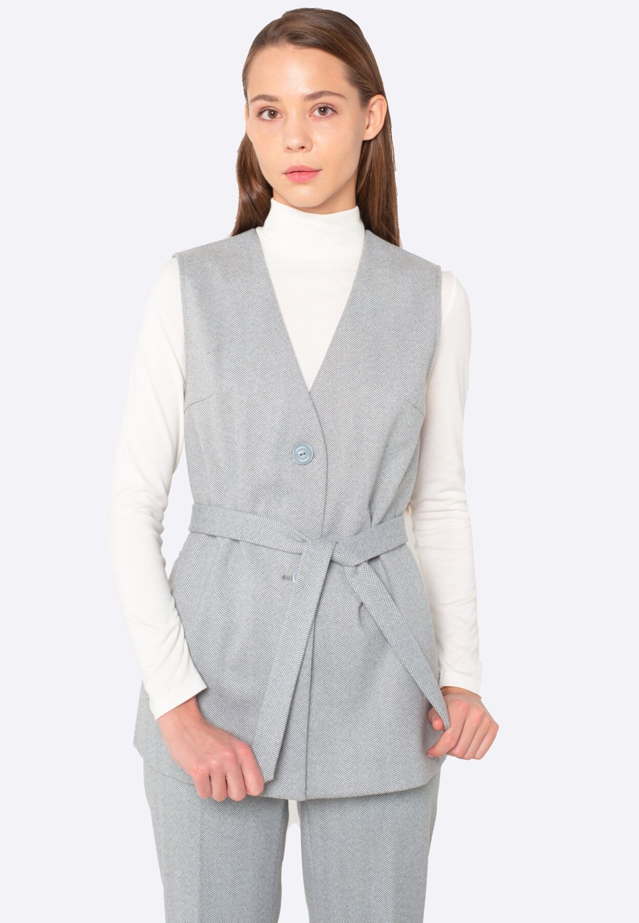 Gray warm vest with a belt made of natural wool fabric 3325
